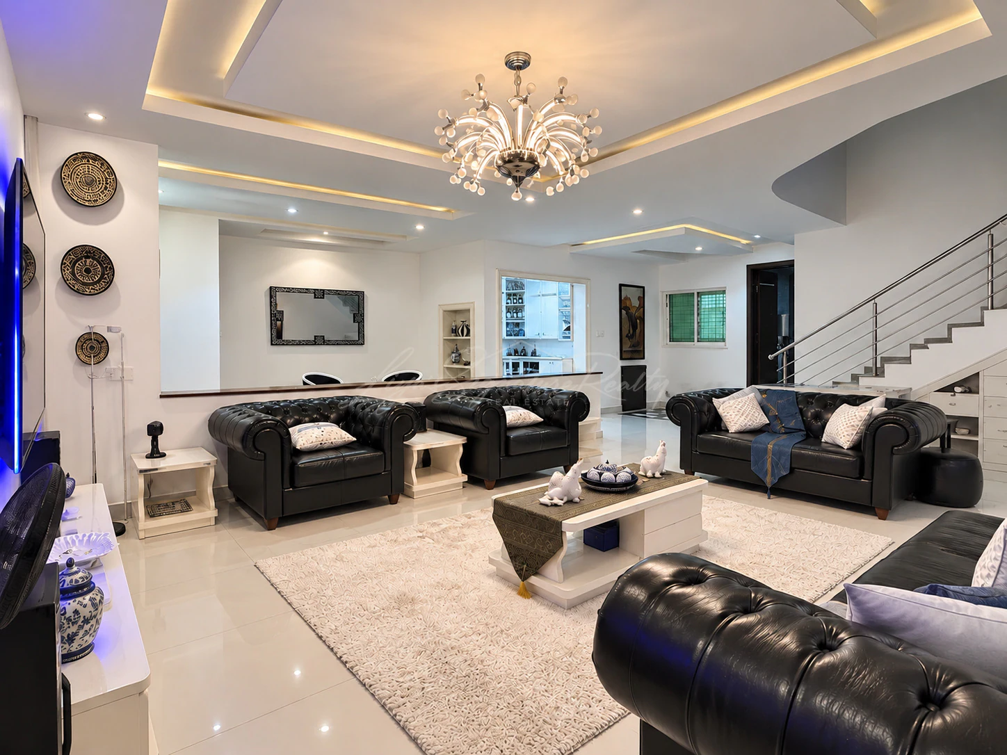 Furnished living room in a Grenadines Resort residence, Katampe